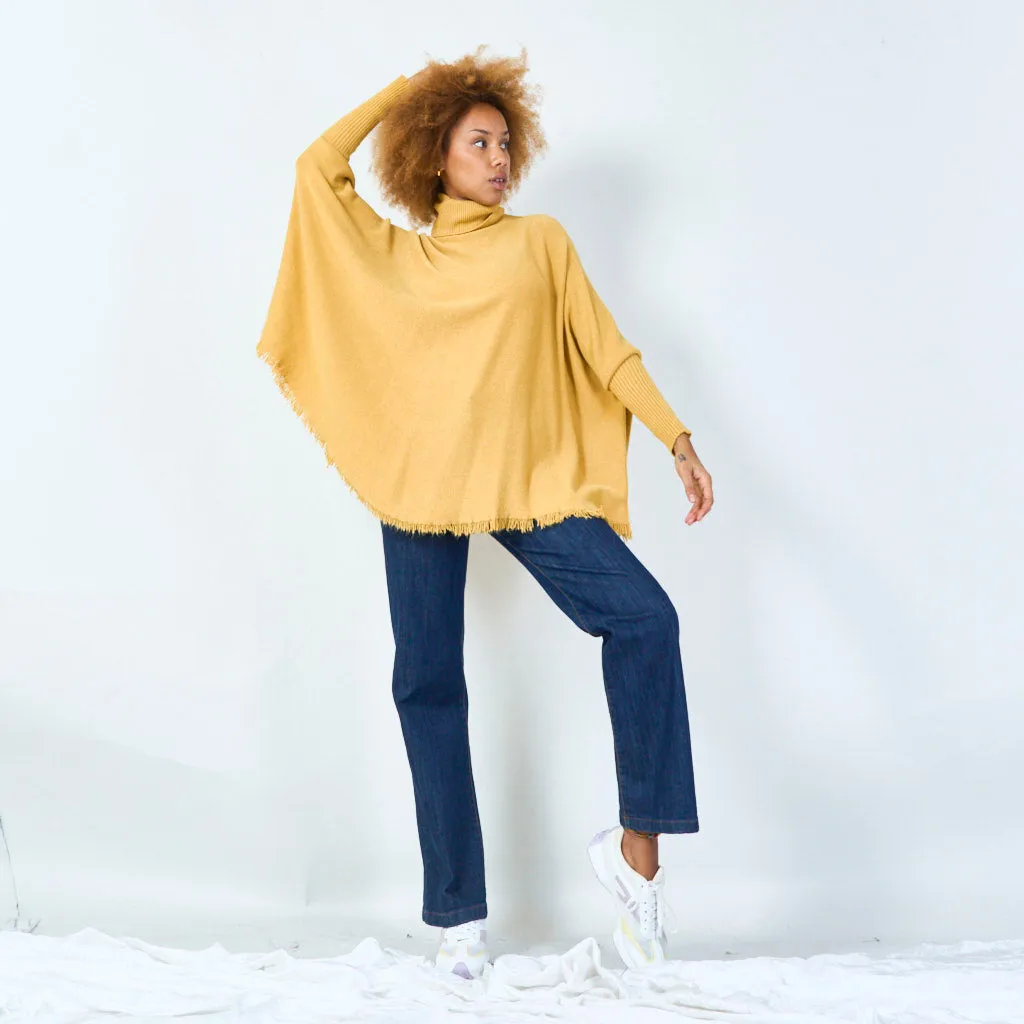 Turtleneck poncho with raw hem wholesale